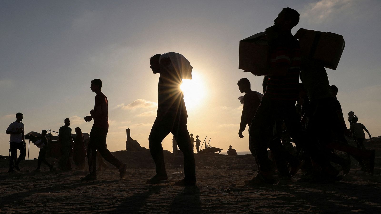 At least 25 people killed after Israeli forces open fire near aid trucks in Gaza, witnesses say | World News
