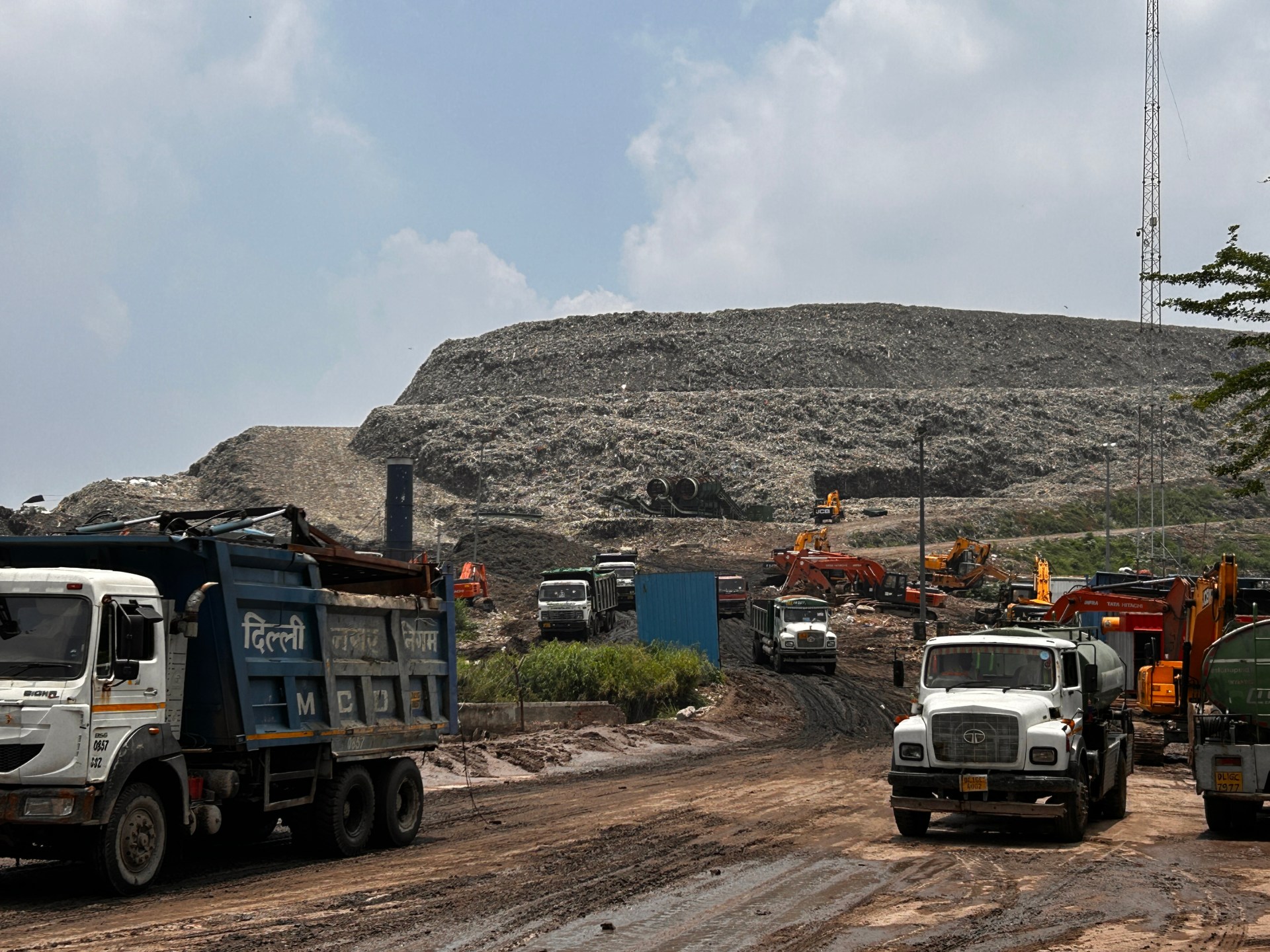 How New Delhi’s garbage mountains become heat bombs for waste pickers | Environment News