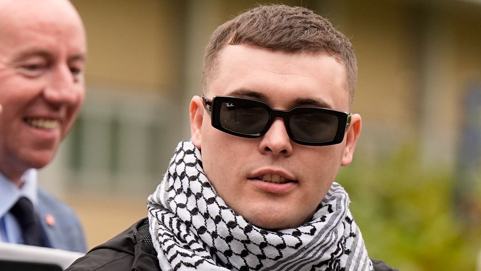 Prosecutors to appeal against decision to throw out terror case against Kneecap rapper | UK News