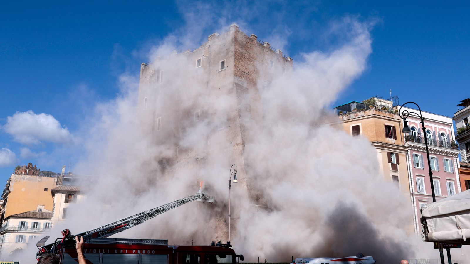 Torre dei Conti: Worker trapped after medieval tower collapses during renovation work in Rome | World News
